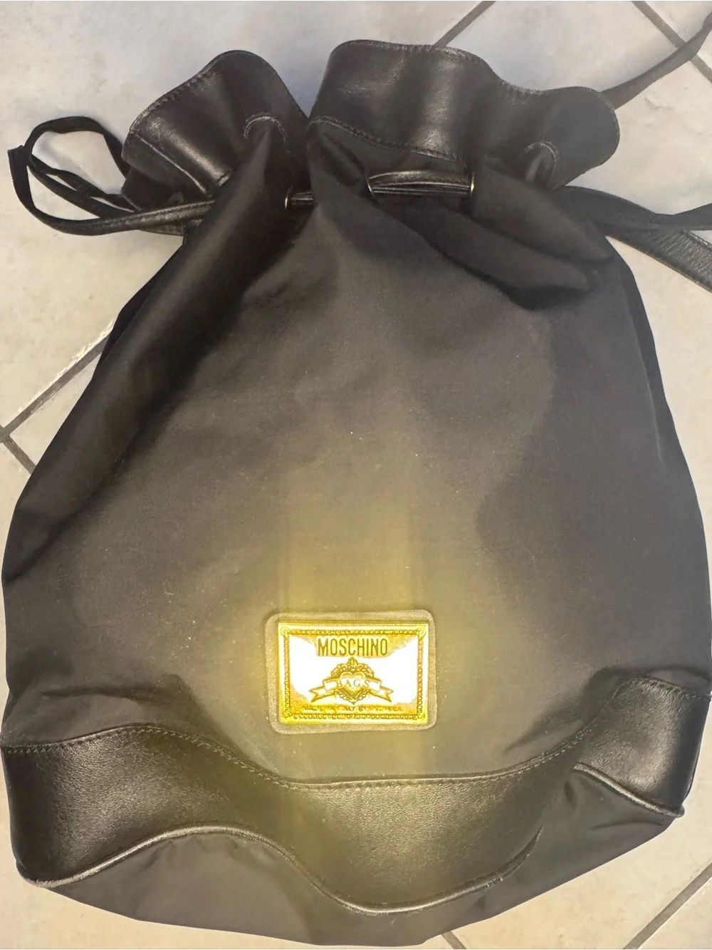 Moschino Black Drawstring Backpack with Gold Logo Patch 14x13x6